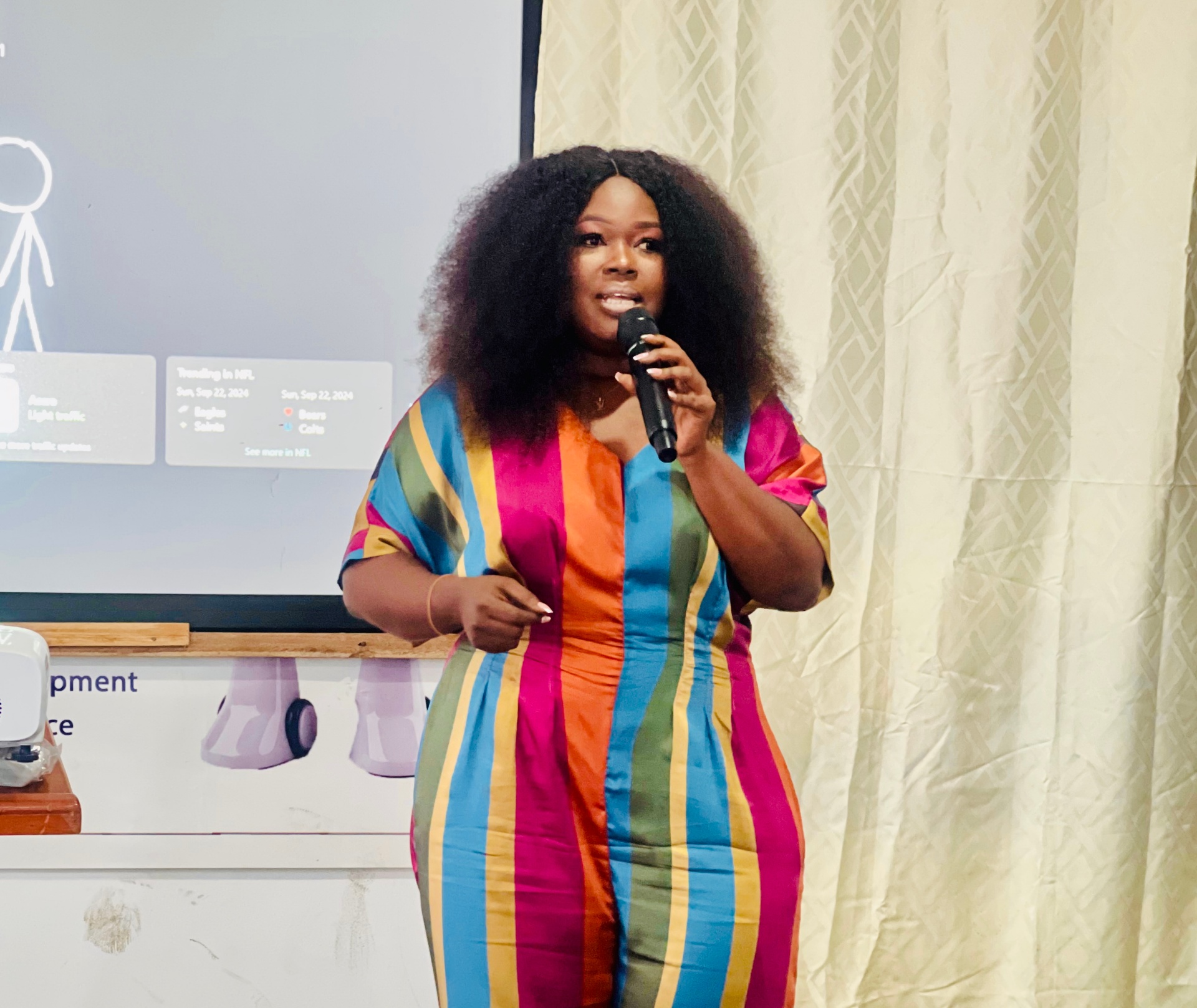 Doreen Oduraa Twum speaking at a Reeny Communications event